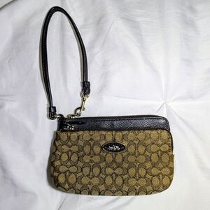 Elegant Brown and Black Coach Wristlet Purse